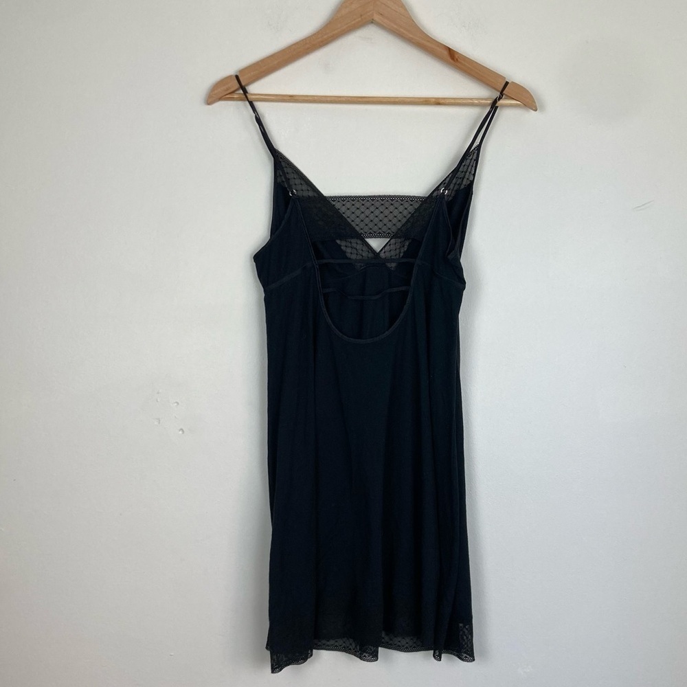 Victoria’s Secret sheer stretch black sleep slip with lace trim. Size medium